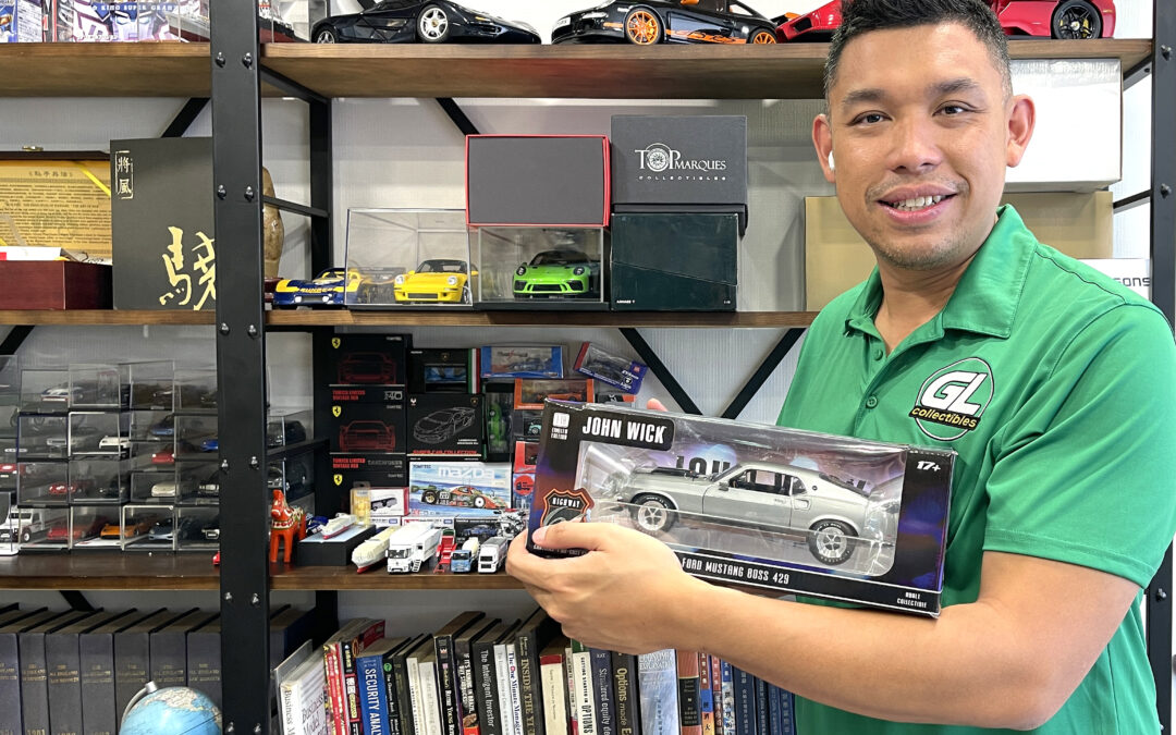 Vincent Tang showing off Greenlight's 1:18 Ford Mustang from John Wick.
